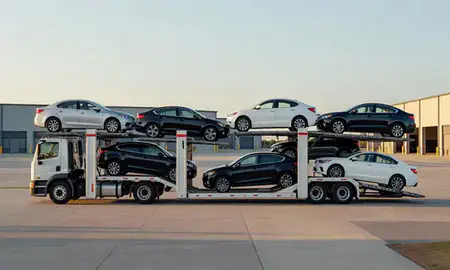 Car transporter parked in an industrial area of Madison, Mississippi, United States