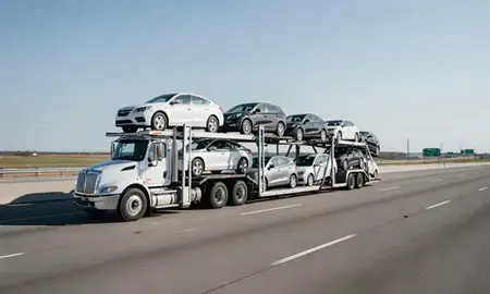 Multi-level car carrier on the highway to Southaven, Mississippi, United States