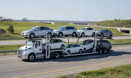 Multi-level car carrier on the highway to Ballwin, Missouri, United States