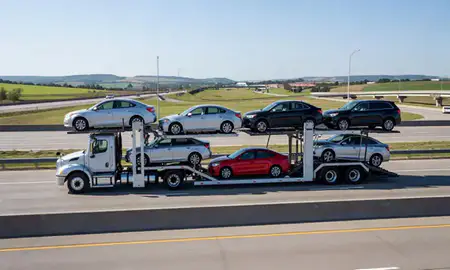 Multi-level car carrier on the highway to Chesterfield, Missouri, United States