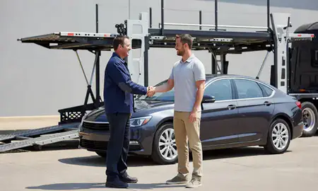 Vehicle owner beside their delivered car in Chesterfield, Missouri, United States