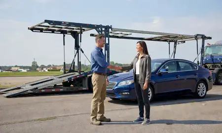 Vehicle owner beside their delivered car in Independence, Missouri, United States