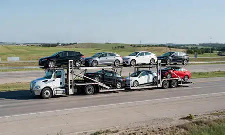 Multi-level car carrier on the highway to Joplin, Missouri, United States
