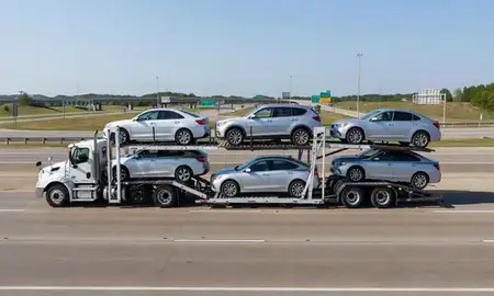 Multi-level car carrier on the highway to Kirkwood, Missouri, United States