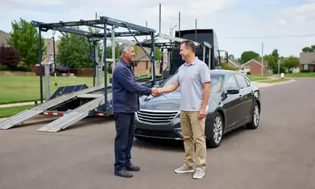 Vehicle owner beside their delivered car in Kirkwood, Missouri, United States