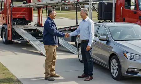 Vehicle owner beside their delivered car in Liberty, Missouri, United States
