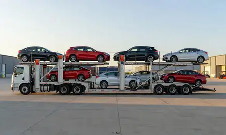 Car transporter parked in an industrial area of Liberty, Missouri, United States