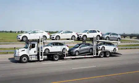 Multi-level car carrier on the highway to Raytown, Missouri, United States