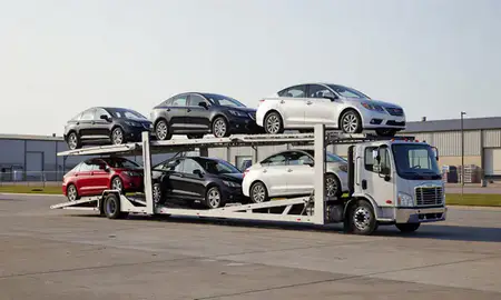 Car transporter loaded with vehicles in Raytown, Missouri, United States
