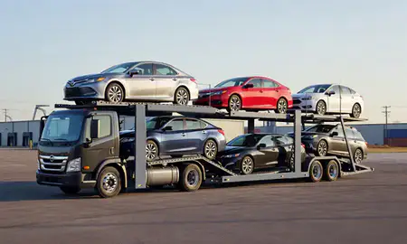 Car transporter loaded with vehicles in Springfield, Missouri, United States