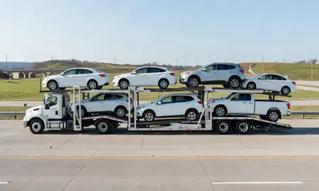 Multi-level car carrier on the highway to St. Charles, Missouri, United States