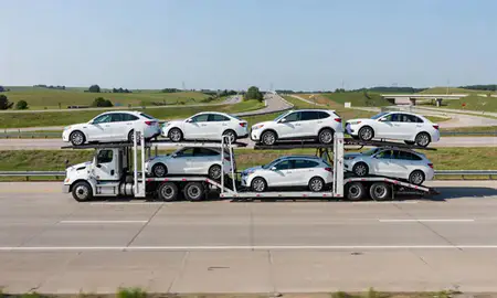 Multi-level car carrier on the highway to St. Joseph, Missouri, United States