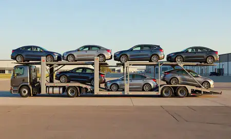 Car transporter parked in an industrial area of St. Joseph, Missouri, United States