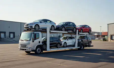 Car transporter loaded with vehicles in St. Joseph, Missouri, United States