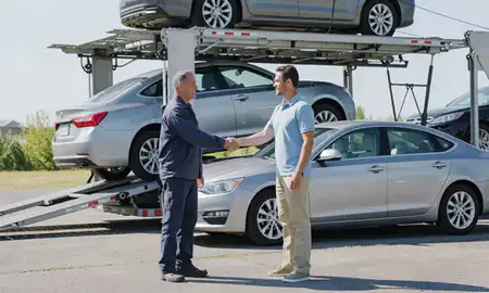 Vehicle owner beside their delivered car in St. Peters, Missouri, United States