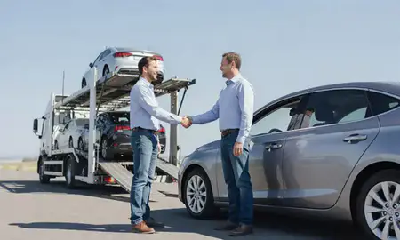 Vehicle owner beside their delivered car in Belgrade, Montana, United States