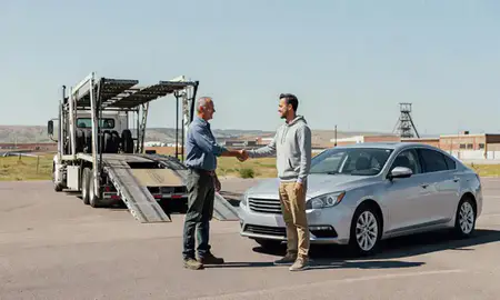 Vehicle owner beside their delivered car in Butte, Montana, United States