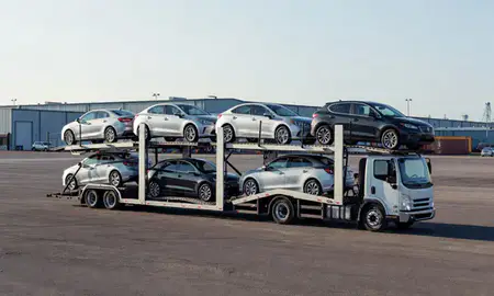 Car transporter loaded with vehicles in Columbia Falls, Montana, United States
