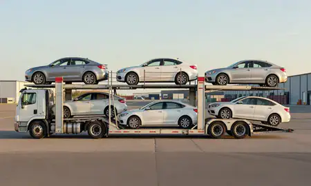 Car transporter parked in an industrial area of Evergreen, Montana, United States