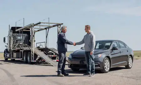 Vehicle owner beside their delivered car in Great Falls, Montana, United States