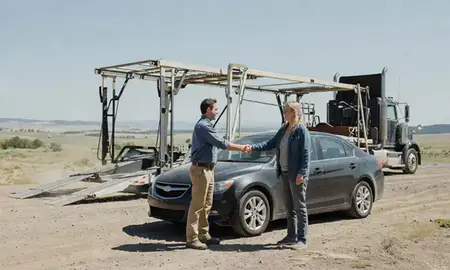 Vehicle owner beside their delivered car in Helena Valley West Central, Montana, United States