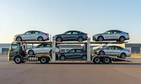 Car transporter parked in an industrial area of Helena Valley West Central, Montana, United States