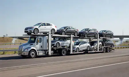 Multi-level car carrier on the highway to Lockwood, Montana, United States