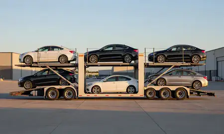 Car transporter parked in an industrial area of Lockwood, Montana, United States