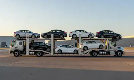 Car transporter parked in an industrial area of Lolo, Montana, United States