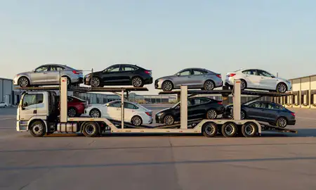 Car transporter parked in an industrial area of Polson, Montana, United States