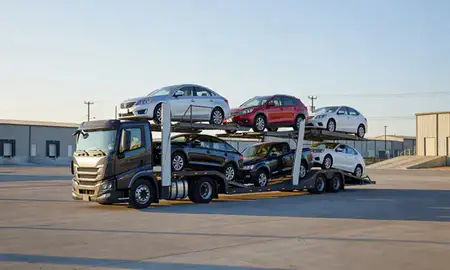 Car transporter loaded with vehicles in Polson, Montana, United States