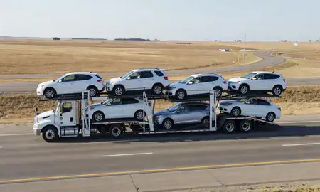 Multi-level car carrier on the highway to Alliance, Nebraska, United States