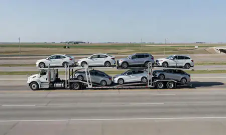 Multi-level car carrier on the highway to Blair, Nebraska, United States