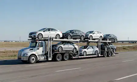 Multi-level car carrier on the highway to Chalco, Nebraska, United States