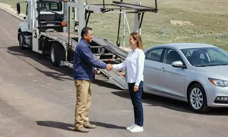 Vehicle owner beside their delivered car in Chalco, Nebraska, United States