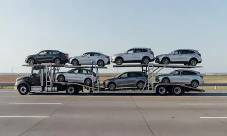 Multi-level car carrier on the highway to Crete, Nebraska, United States