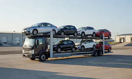 Car transporter loaded with vehicles in Crete, Nebraska, United States