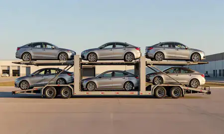 Car transporter parked in an industrial area of Gering, Nebraska, United States
