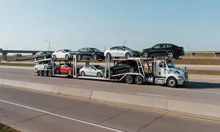 Multi-level car carrier on the highway to La Vista, Nebraska, United States