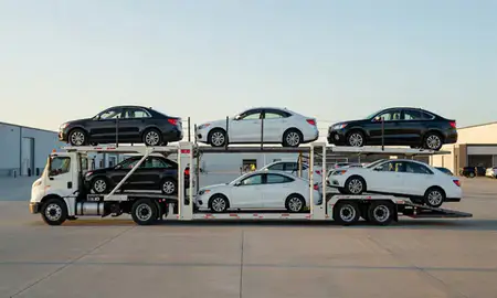 Car transporter parked in an industrial area of Lexington, Nebraska, United States