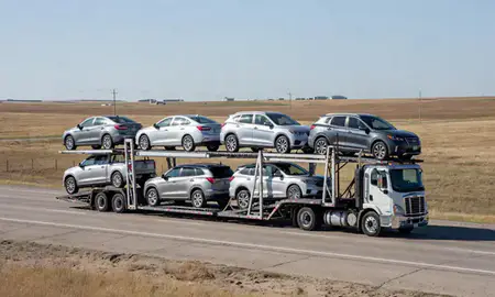 Multi-level car carrier on the highway to McCook, Nebraska, United States