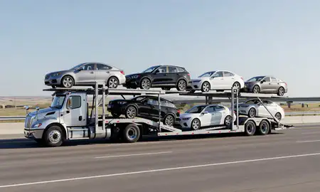 Multi-level car carrier on the highway to Nebraska City, Nebraska, United States