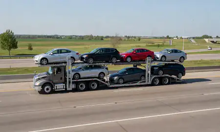 Multi-level car carrier on the highway to Papillion, Nebraska, United States
