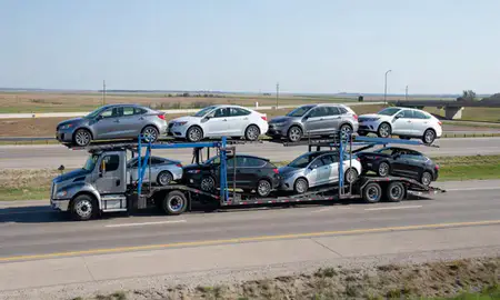 Multi-level car carrier on the highway to Ralston, Nebraska, United States