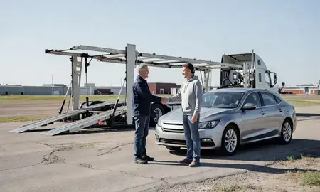 Vehicle owner beside their delivered car in South Sioux City, Nebraska, United States