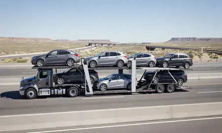 Multi-level car carrier on the highway to Nevada, United States