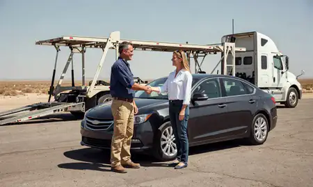 Vehicle owner beside their delivered car in Enterprise, Nevada, United States