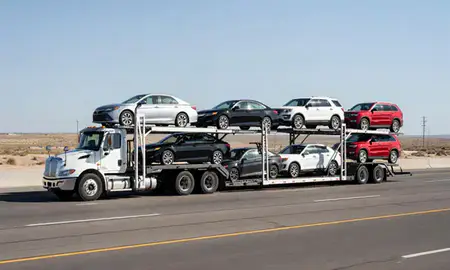 Multi-level car carrier on the highway to Fallon, Nevada, United States