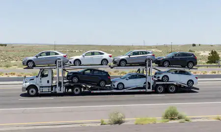 Multi-level car carrier on the highway to Fernley, Nevada, United States