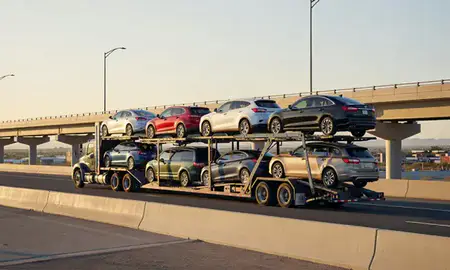Car transporter with the Fernley, Nevada, United States skyline behind it